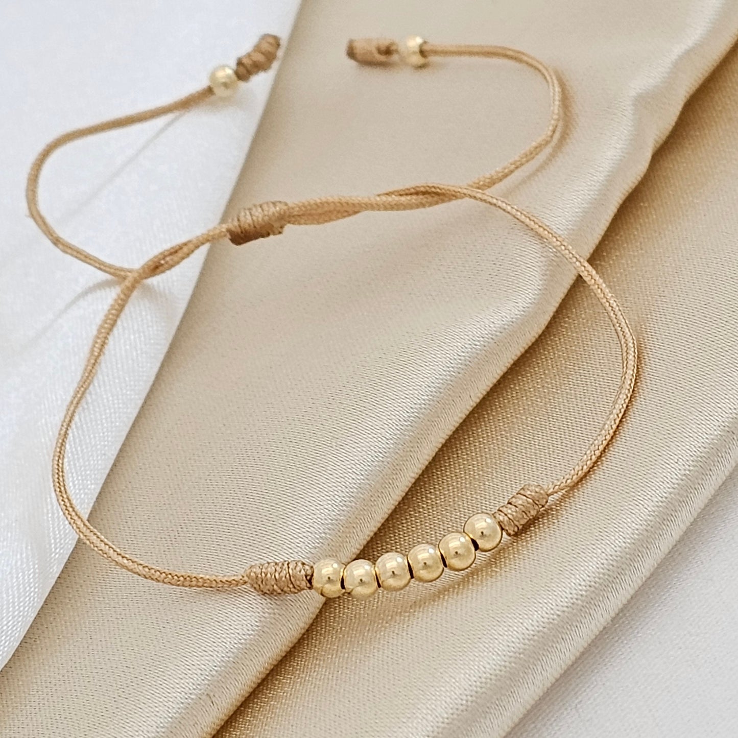 MJ PULSERA GOLD #3 SENCILLA BEIGE