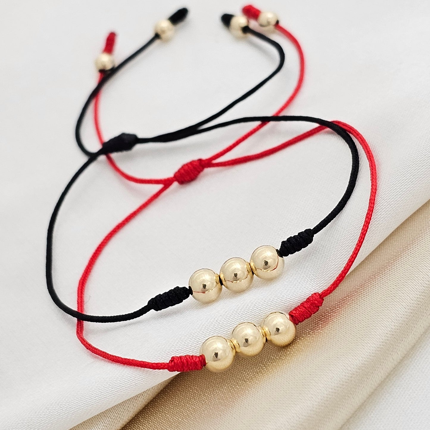 MJ PULSERA GOLD DUO SENCILLA S / TEJIDO # 5 ,# 4 ROJA NEGRA