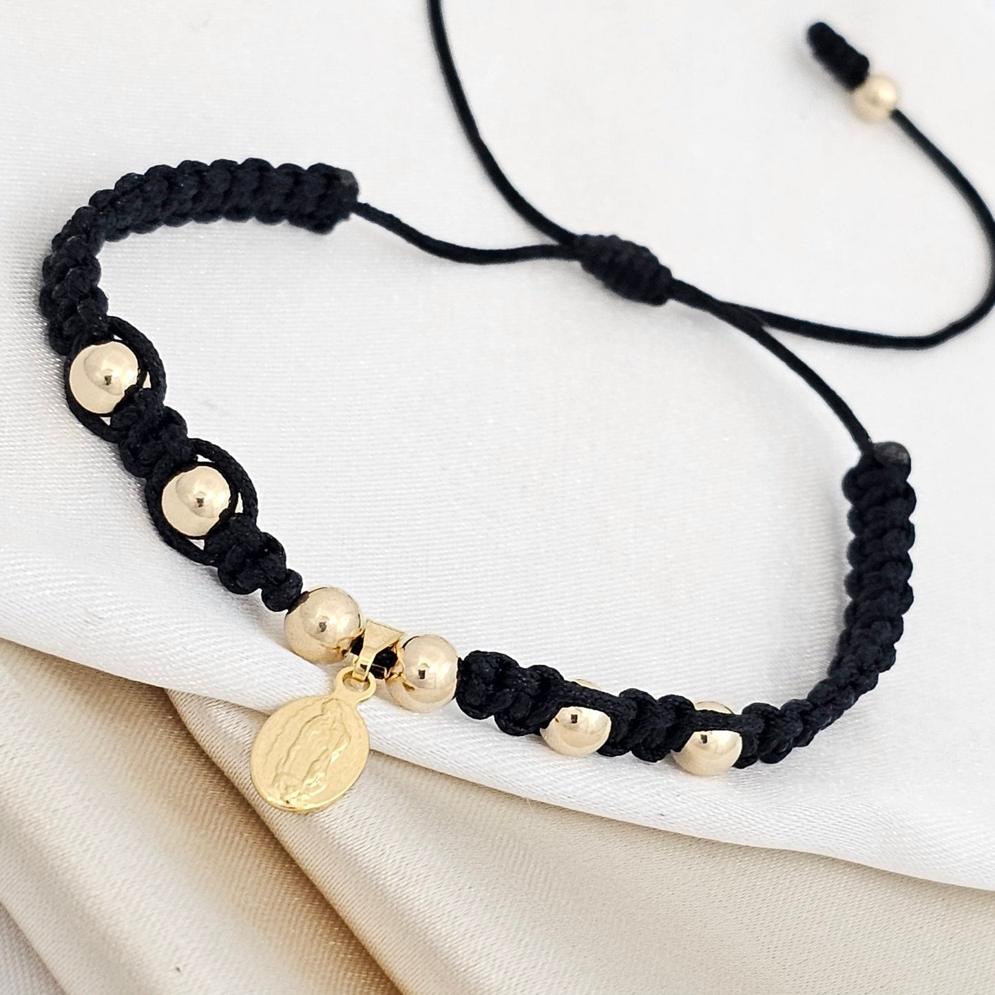 PULSERA GOLD # 5#4 DIJE MINI GUADALUPE NEGRA