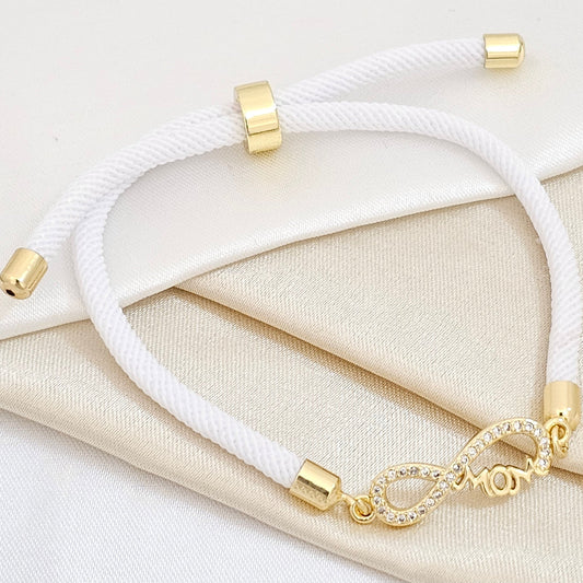 PULSERA BLANC AJUSTABLE C / HERRAJE INFINITO DORAD