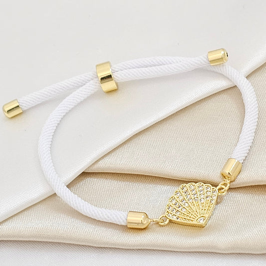 PULSERA BLANC AJUSTABLE C / HERRAJE PARACAIDA DORAD