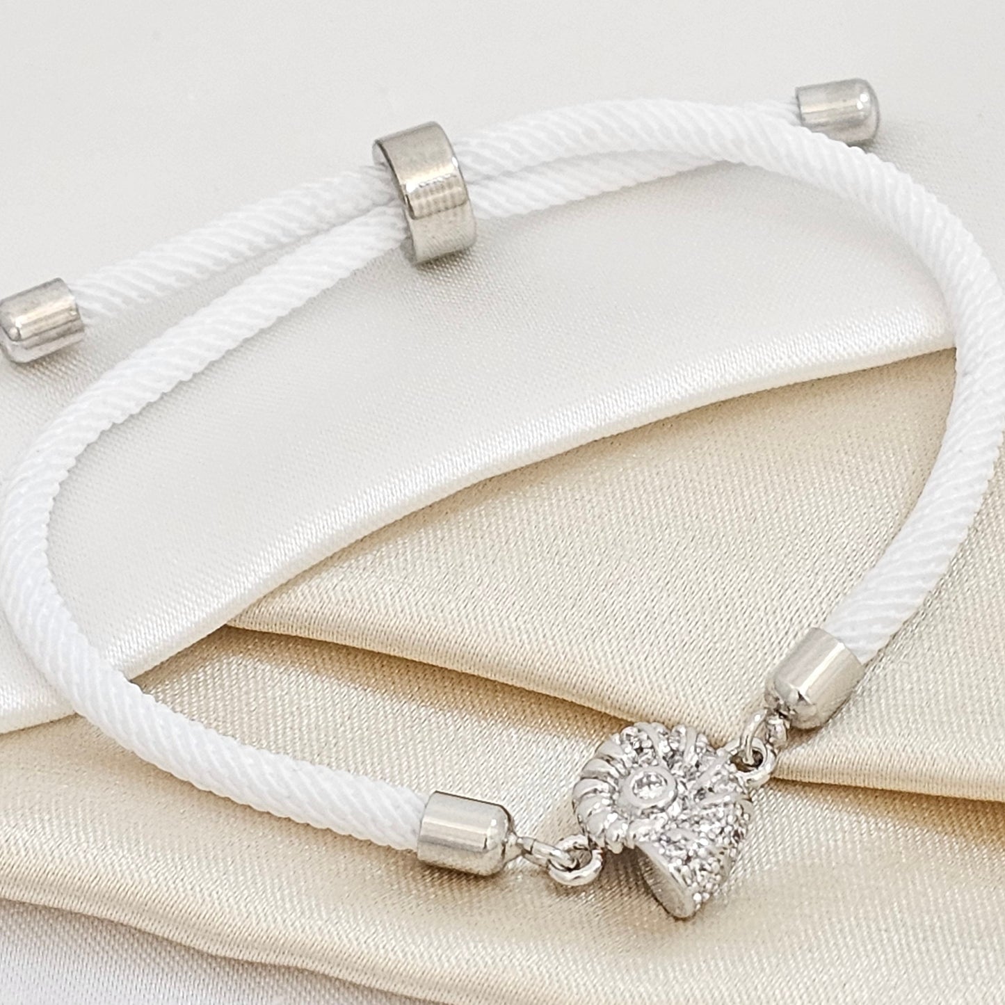 PULSERA BLANC AJUSTABLE C/ HERRAJE CARACOL PLAT