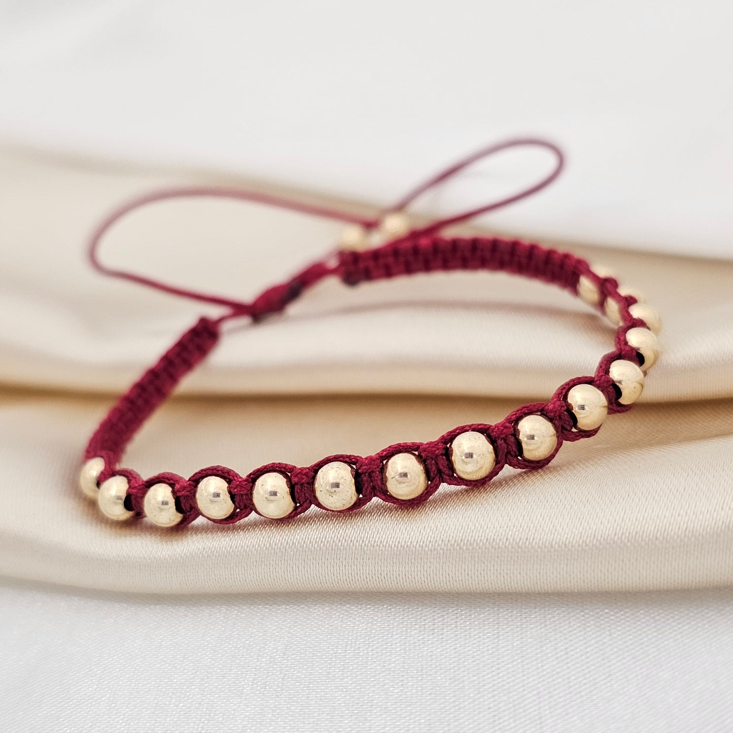 PULSERA GOLD  MACRAME  # 4 VINO TINTO