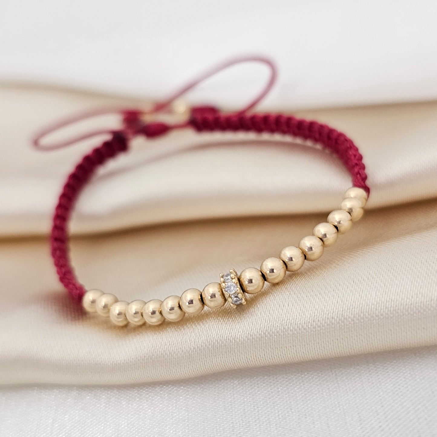 MJPULSERA MACRAME GOLD#3 Y CIRCONIA VINO TINTO