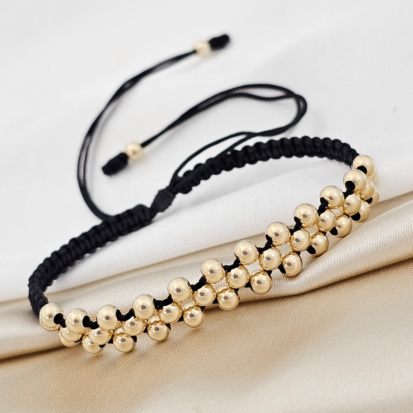 MJ PULSERA MACRAME GOLD #4 TRENZADA NEGRA